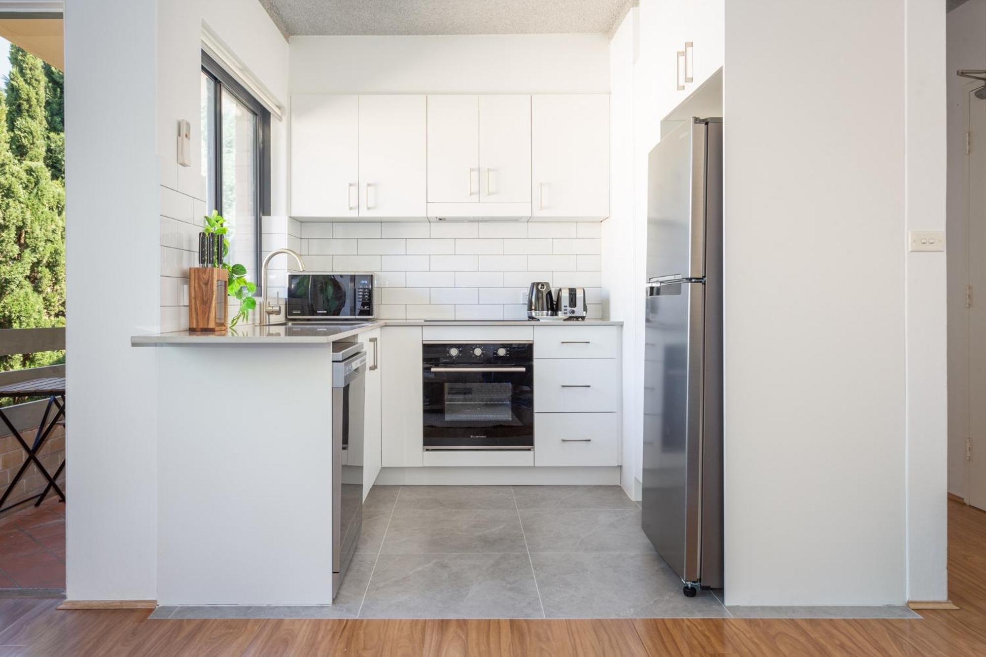 Unit With Balcony Backyard And Parking Near Shops Apartment Sydney